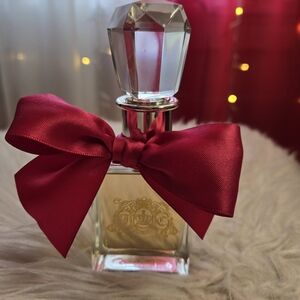 Juicy Couture Perfume Bottle with Deep Red Bow